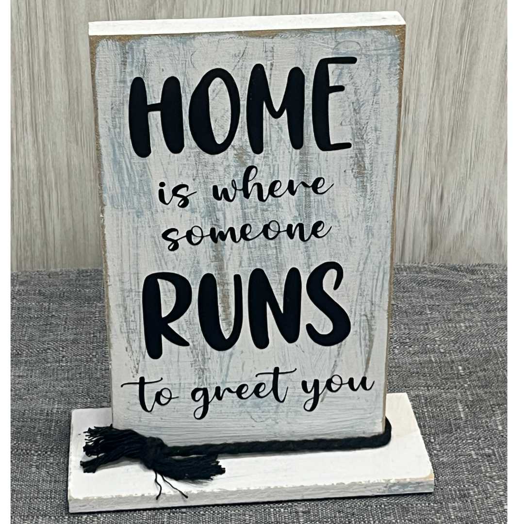 "Home Is Where Someone Runs to Greet You" Wooden Shelf Decor image 1