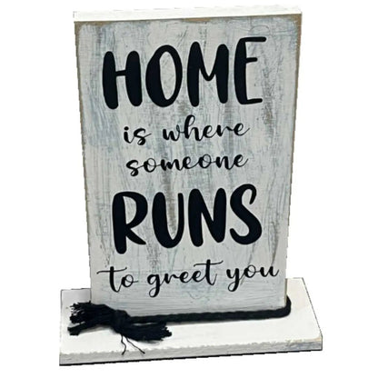 "Home Is Where Someone Runs to Greet You" Wooden Shelf Decor image 0